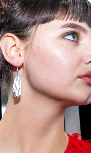 Ghost with the Most earrings