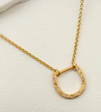 Sparkly gold horseshoe necklace