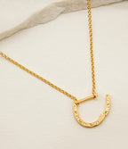 Sparkly gold horseshoe necklace