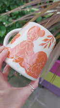 Load and play video in Gallery viewer, Orange Goddess mug by Crock-Â-Shwt
