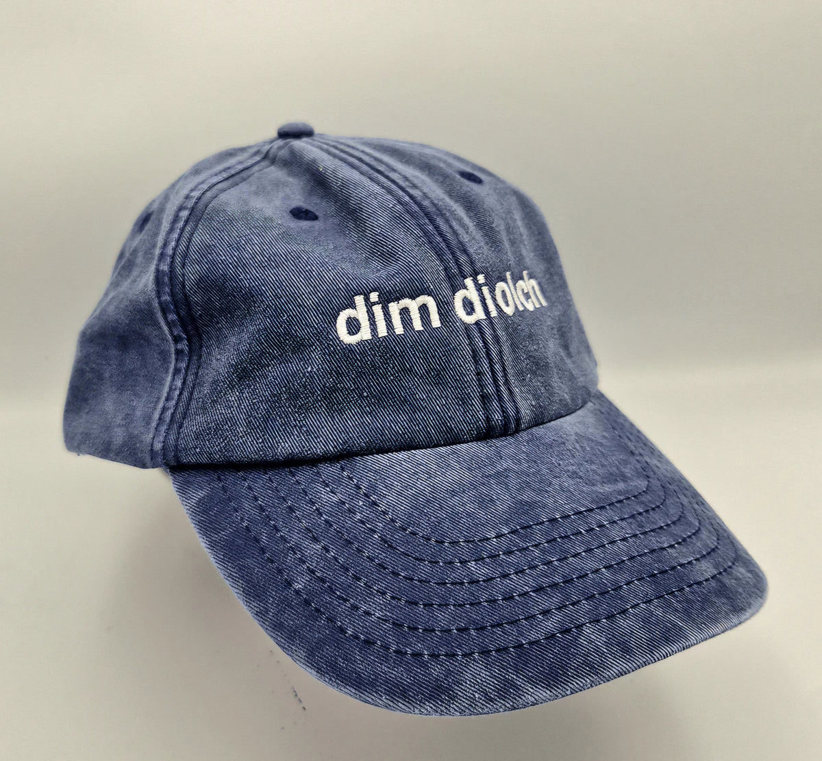 Black and Beech "dim diolch" baseball cap in Denim Blue