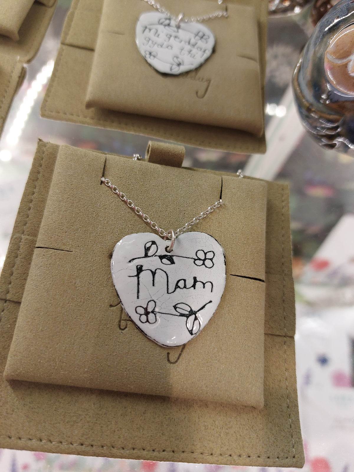 Heart enamel necklaces by Buddug