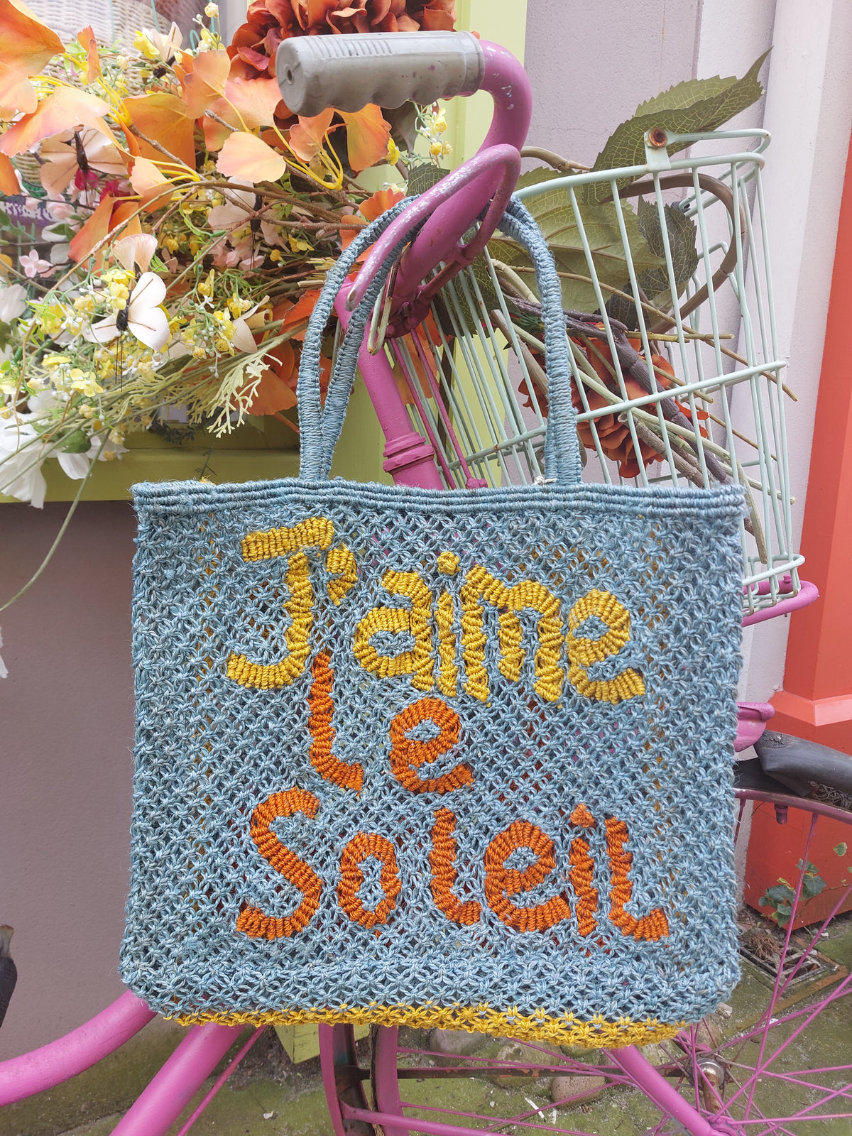 J'Aime Le Soleil jute bag in sky blue